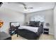 Stylish bedroom with a dark-colored bed frame and minimalist decor at 3007 N 84Th Pl, Scottsdale, AZ 85251