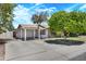 Charming single-story home with a covered carport and mature shade trees at 3007 N 84Th Pl, Scottsdale, AZ 85251