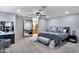 Spacious primary bedroom with a seating area and an en-suite bathroom view at 3007 N 84Th Pl, Scottsdale, AZ 85251