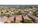 A picturesque aerial scene features homes in a desert community near mountain and desert scenery at 32096 N 132Nd Dr, Peoria, AZ 85383