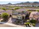 Beautiful two-story house featuring a spacious two-car garage and desert landscaping at 32096 N 132Nd Dr, Peoria, AZ 85383