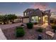 Delightful two-story home features a paver driveway, charming landscaping, and a welcoming front porch at 32096 N 132Nd Dr, Peoria, AZ 85383