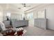 Serene bedroom with natural light, tray ceiling and calming, neutral color scheme at 32096 N 132Nd Dr, Peoria, AZ 85383