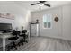 Bright home office offering a comfortable workspace with shuttered windows and ample room at 32096 N 132Nd Dr, Peoria, AZ 85383