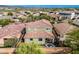 Two-story home boasts a quaint backyard with a covered patio and neutral toned exterior at 32096 N 132Nd Dr, Peoria, AZ 85383