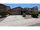 Inviting single-story home with a two-car garage, well-maintained landscaping and a charming, covered entryway at 3545 W Glass Ln, Phoenix, AZ 85041