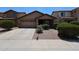 Inviting single-story home with a two-car garage, well-maintained landscaping and a charming, covered entryway at 3545 W Glass Ln, Phoenix, AZ 85041