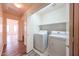 Functional laundry room equipped with a washer and dryer, offering convenience for household chores at 3545 W Glass Ln, Phoenix, AZ 85041
