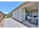 Patio, lawn, and hardscape, with a clear view of a sliding door at 38144 W San Clemente St, Maricopa, AZ 85138