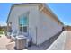 Exterior view of a single-Gathering home with a large window and neatly maintained landscaping at 38144 W San Clemente St, Maricopa, AZ 85138