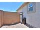 View of the side yard, with a water filtration system at 38144 W San Clemente St, Maricopa, AZ 85138