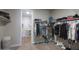 Spacious walk-in closet with ample storage space and organization for clothes, shoes, and accessories at 38144 W San Clemente St, Maricopa, AZ 85138