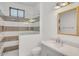Modern bathroom with walk-in shower, updated vanity, and contemporary finishes creates a sleek and stylish design at 3924 E Roma Ave, Phoenix, AZ 85018