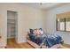 Charming bedroom with floral accents, a plush bed, and a cozy ambiance that creates a serene retreat at 3924 E Roma Ave, Phoenix, AZ 85018