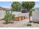 Private courtyard featuring raised garden beds and a stone pathway at 3924 E Roma Ave, Phoenix, AZ 85018