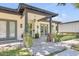 Charming home featuring a covered front entrance with a brick walkway and manicured landscaping at 3924 E Roma Ave, Phoenix, AZ 85018