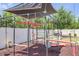 Backyard playground with climbing structure, swings, and playhouse at 3924 E Roma Ave, Phoenix, AZ 85018