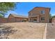 Backyard featuring potential for landscaping and block wall at 4380 W White Canyon Rd, San Tan Valley, AZ 85144