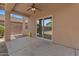 Covered patio with ceiling fan, offering a relaxing outdoor space at 4380 W White Canyon Rd, San Tan Valley, AZ 85144