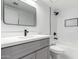 A beautifully renovated bathroom with sleek fixtures, modern vanity, and tiled shower at 5230 E Brown Rd # 114, Mesa, AZ 85205