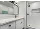 Bathroom features dual vanity, quartz countertop, black hardware, and walk-in shower at 5230 E Brown Rd # 114, Mesa, AZ 85205