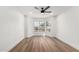 Bedroom features luxury vinyl plank flooring, bay window providing ample natural light, and neutral paint at 5230 E Brown Rd # 114, Mesa, AZ 85205