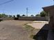Expansive backyard showcases a mix of desert landscaping, block fencing and a brick-paved area at 608 W 2Nd Pl, Mesa, AZ 85201