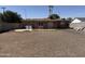 Spacious backyard area, featuring laundry hookups and ample room for various uses at 608 W 2Nd Pl, Mesa, AZ 85201