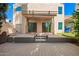 Expansive backyard showcasing a modern deck, covered patio and well-maintained landscaping at 6510 S Hazelton Ln # 101, Tempe, AZ 85283