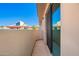 Balcony view showcases the community, offering a glimpse of neighborhood architecture at 6510 S Hazelton Ln # 101, Tempe, AZ 85283
