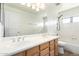 Bathroom features a double sink vanity, tile flooring, and combination shower-tub at 6510 S Hazelton Ln # 101, Tempe, AZ 85283