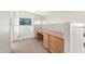 Loft featuring a built-in desk area, perfect for a home office setup with lots of light at 6510 S Hazelton Ln # 101, Tempe, AZ 85283
