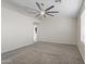 Bedroom featuring soft carpeting and a ceiling fan at 6623 S 23Rd Dr, Phoenix, AZ 85041