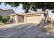 Well-kept single-Gathering home with low-maintenance desert landscaping and an attached two-car garage at 6623 S 23Rd Dr, Phoenix, AZ 85041
