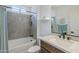 Bathroom featuring a shower over bath, granite countertop and modern fixtures at 699 E Watermelon Ln, Queen Creek, AZ 85140