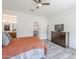 Bedroom with dresser and views to kitchen, dining, and walk-in closet at 699 E Watermelon Ln, Queen Creek, AZ 85140