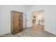Bedroom featuring wood floors and a view to the Kitchen at 699 E Watermelon Ln, Queen Creek, AZ 85140