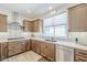 Kitchen featuring stainless steel appliances, tile backsplash, and countertops at 699 E Watermelon Ln, Queen Creek, AZ 85140