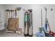 Water filtration system surrounded by various tools and cleaning products in the utility room at 699 E Watermelon Ln, Queen Creek, AZ 85140