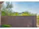 Walled backyard provides privacy and features desert landscaping at 7152 E Night Glow Cir, Scottsdale, AZ 85266