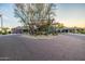 Stunning clubhouse entrance, with lush landscaping, sets the tone for an upscale living experience at 7152 E Night Glow Cir, Scottsdale, AZ 85266