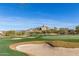 Scenic golf course view featuring a sand trap, lush green fairway and boulder outcroppings at 7152 E Night Glow Cir, Scottsdale, AZ 85266