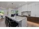 Spacious kitchen with a large island, modern cabinetry, stainless steel appliances and beautiful countertops at 7152 E Night Glow Cir, Scottsdale, AZ 85266