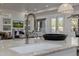 Close-up of a kitchen island sink with a stylish faucet, contrasting decor, and an open-concept design at 7152 E Night Glow Cir, Scottsdale, AZ 85266