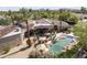 Aerial view of the estate showcasing the pool, patios, landscaping, and architecture at 7640 E Poinsettia Dr, Scottsdale, AZ 85260