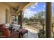 Expansive covered patio overlooking the desert landscaped backyard at 7640 E Poinsettia Dr, Scottsdale, AZ 85260