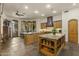 Spacious kitchen with double islands, granite countertops, custom cabinetry, and high-end appliances at 7640 E Poinsettia Dr, Scottsdale, AZ 85260