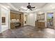 Spacious room featuring custom cabinets, granite countertops, and a cozy ambiance at 7640 E Poinsettia Dr, Scottsdale, AZ 85260