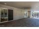 The covered back patio has brick pavers, recessed lights and multiple access points to the home's interior at 807 E San Remo Ave, Gilbert, AZ 85234