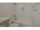 Bright bathroom with updated vanity, toilet, and shower-tub at 807 E San Remo Ave, Gilbert, AZ 85234
